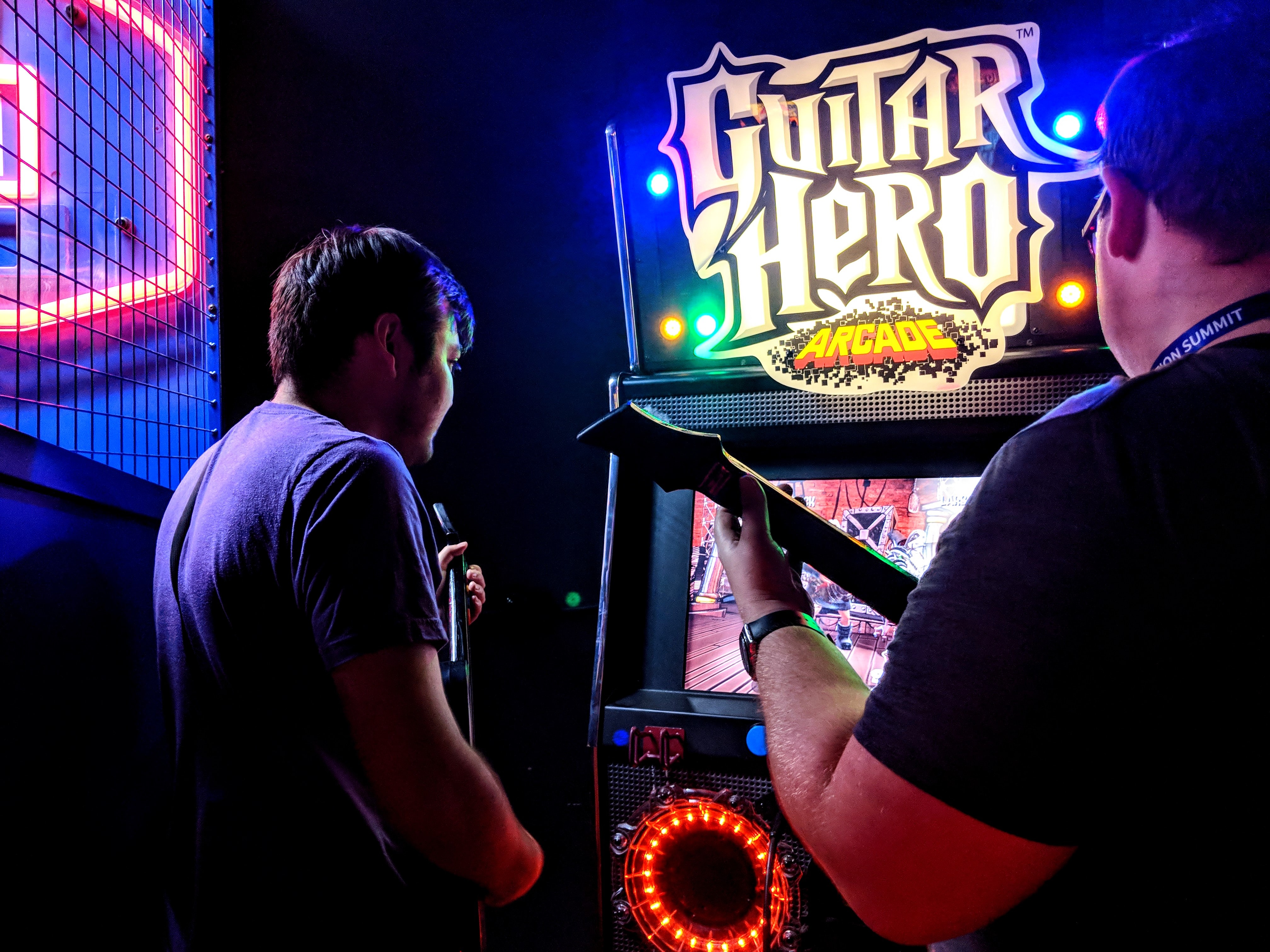 Guitar Hero Arcade- look how much fun they're having!